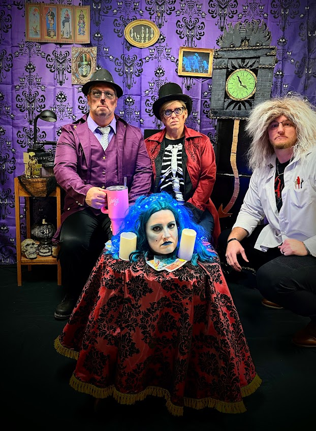 7th grade teachers dress up in Haunted Mansion style (Mr. Gonzalez, Ms. Jensen, Mr. Lewis, and Ms. Goulding)