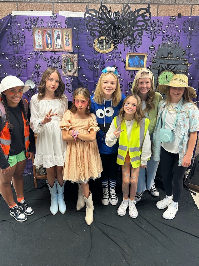 Tonaquint girls dress up as construction workers, Swifties, Cookie Monster, a beekeeper, and a tourist on Halloween