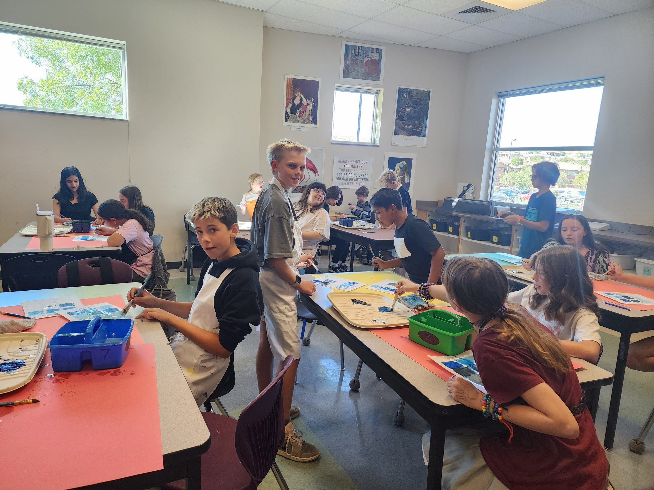 Ms. Bulkley's class learns how to mix shades and tints to make a monochromatic palette during art class.